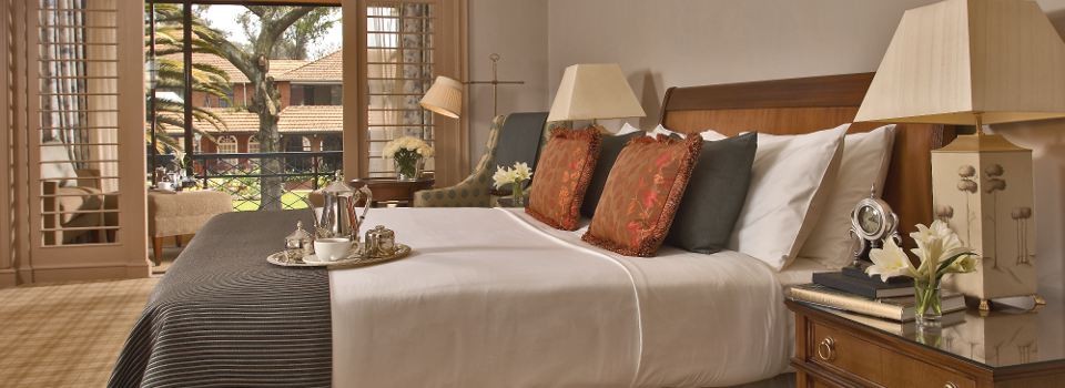Guest room with views over the garden at the Fairmont The Norfolk Hotel