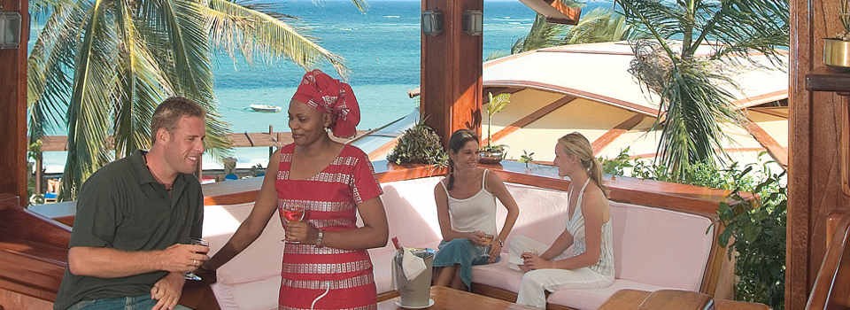Guests relaxing at Marcos Bar at the Leopard Beach Resort.