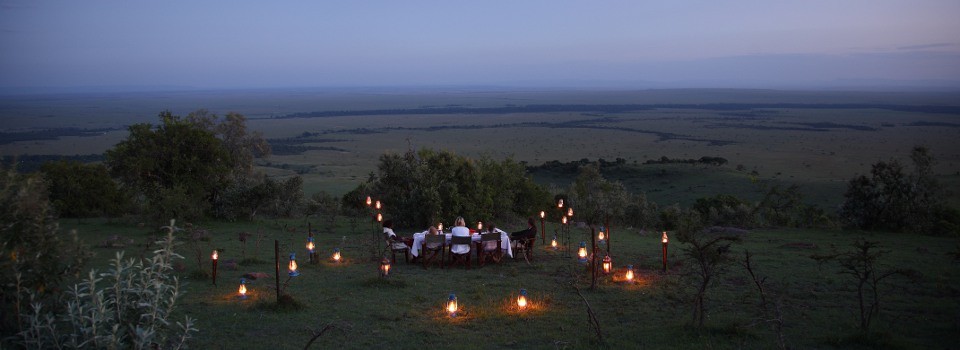 Enjoy sun downers on the Masai Mara at Sanctuary Olonana Lodge 