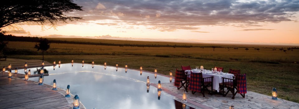 Drink in the views of the Masai Mara from the pool at Kichwa Tembo Tented Camp