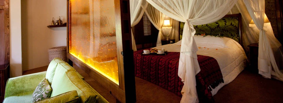 Luxury bedroom at Arusha Coffee Lodge